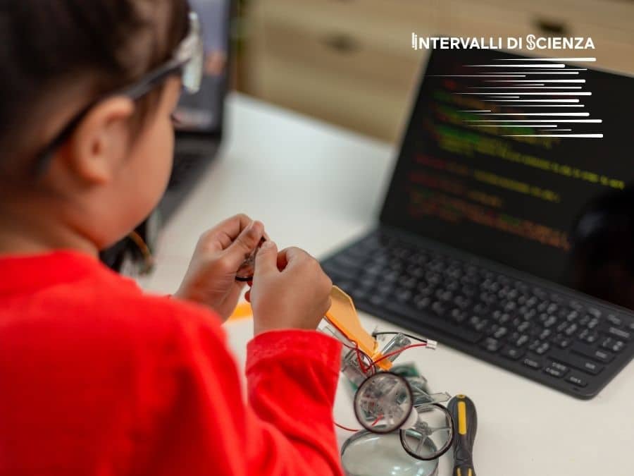 Una bambina alle prese con il coding